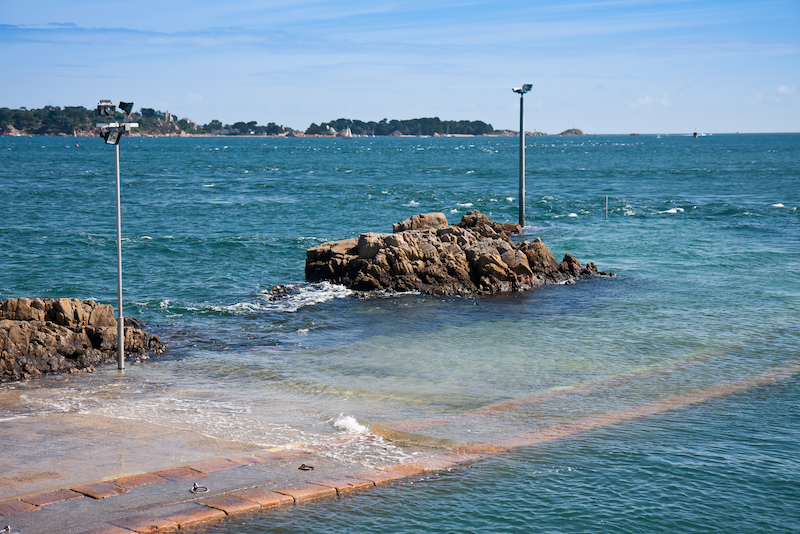 Flooded coastal pier during high tide